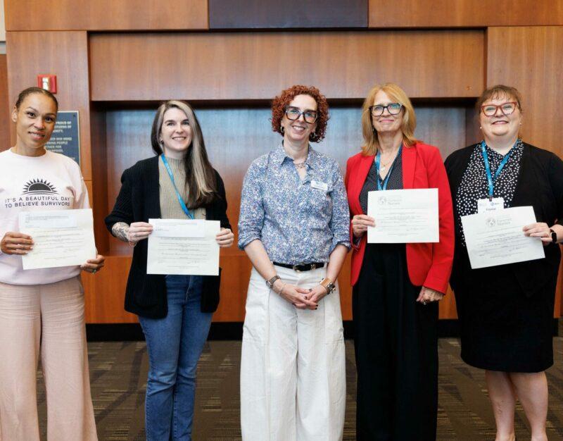 A group photo of forensic nurses at the 2025 conference